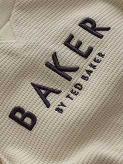 Baker by Ted Baker Textured Long Sleeve Romper^ Rompers & Overalls