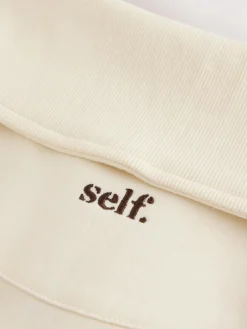 New self. Ecru Half Zip Collar Sweatshirt