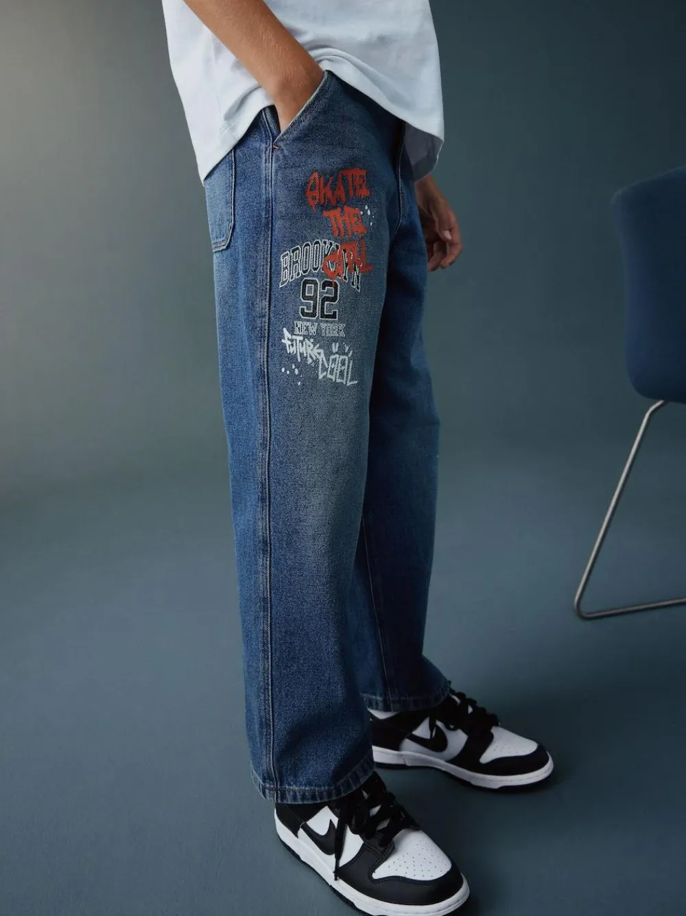 Next Varsity All-Over Print Mid Blue Denim Wide Fit Authentic Jeans (3-16yrs)^BOY Jeans|Jeans